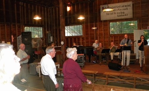 Dr. Neihof and his wife Agnes enjoy the song leaders